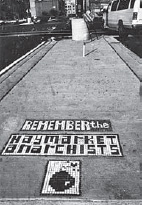 Remember the Haymarket Anarchists, hand-cut stone mosaic installed at the Haymarket site, 1996 (Kehben Grifter)