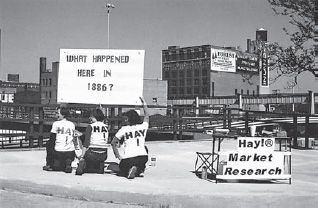 Lauren Cumbia, Dara Greenwald, and Blithe Riley, Hay! Market Research Group, part of the Haymarket Eight-Hour Action Series, 2002 (Michael Piazza)