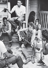 Danny Lyon, Bob Dylan Behind the SNCC Office, Greenwood, Mississippi, 1963 (from Memories of the Southern Civil Rights Movement, copyright Danny Lyon/Magnum Photos)