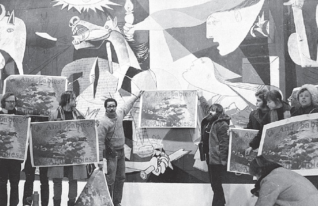 Demonstration at the Museum of Modern Art in front of Picasso’s Guernica by a group from the Art Workers’ Coalition protesting the Museum of Modern Art’s reneging on their agreement to co-produce the Artists’ Poster Committee’s poster Q: And Babies?, January 3, 1970 (photograph by Jan van Raay, copyright by Jan van Raay)