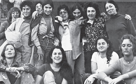 Womanhouse, group photograph of some of the participants, ca. 1971–1972. Top row, left to right: Ann Mills, Mira Schor, Kathy Huberland, Christine Rush, Judy Chicago, Robbin Schiff, Miriam Schapiro, Sherry Brody. Bottom row: Faith Wilding, Robin Mitchell, Sandra Orgel, Judy Huddleston. Not shown: Jan Oxenburg, Paul Longendyde, Karen LeCocq, Camille Grey, Nancy Youdelman, Shawnee Wollenman, Janice Lester, Beth Bachenheimer, Robin Weltsch, and Marcia Salisbury (courtesy of Double X, Nancy Youdelman, Janice Lester, and Faith Wilding)