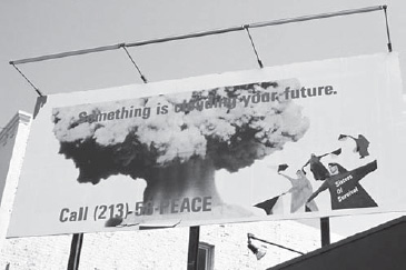 Sisters of Survival, Something Is Clouding Your Future billboard, 1985 (image ID# wb85 2195, Woman’s Building Image Archive, Otis College of Art and Design)