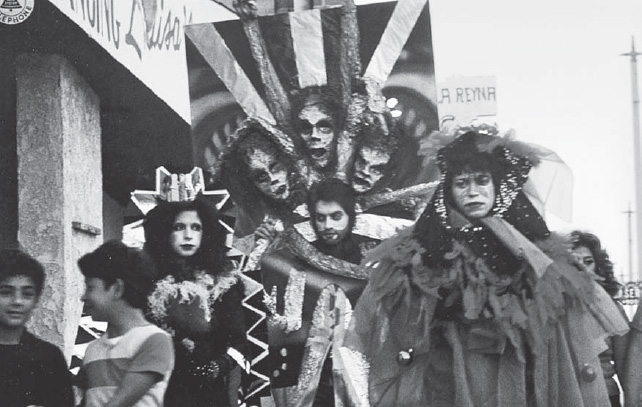 Asco, Walking Mural, 1972; left to right: Patssi Valdez, Willie Herrón, and Gronk (photograph by Harry Gamboa Jr., copyright Harry Gamboa Jr., courtesy of the UCLA Chicano Studies Research Center)