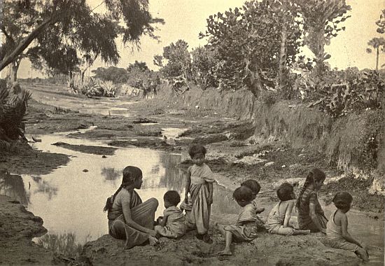 CHILDREN WADING