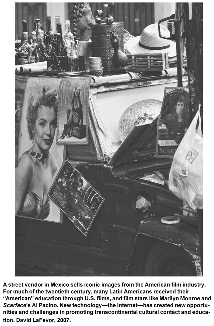 A street vendor in Mexico sells iconic images from the American film industry. For much of the twentieth century, many Latin Americans received their “American” education through U.S. films, and film stars like Marilyn Monroe and Scarface’s Al Pacino. New technology—the Internet—has created new opportunities and challenges in promoting transcontinental cultural contact and education. David LaFevor, 2007.