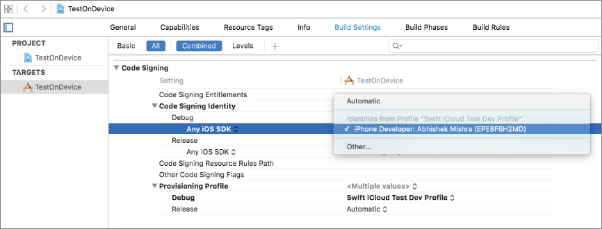 Screenshot of Project window with Any iOS SDK selected under Debug option in Code Signing Identity and a drop down with the option iPhone developer: Abhishek Mishra (EPE8F6H2MD) selected. 