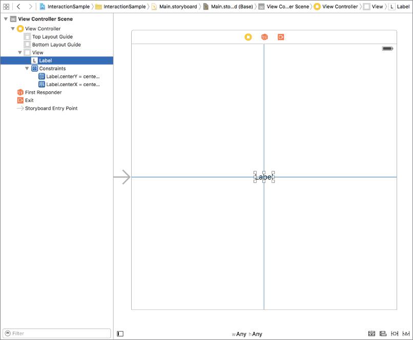 Screenshot of a storyboard screen with text Label framed at the center of the canvas and Label option selected under View Controller Scene.