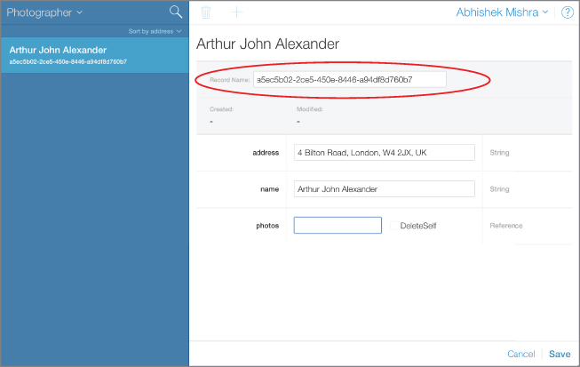 Screenshot of the Photographer tab in CloudKit dashboard with Arthur John Alexander highlighted and the unique record identifier in the Record Name attribute encircled.