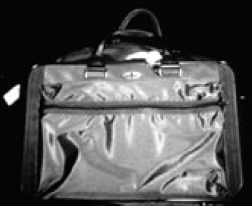 Small nylon suitcase containing classified documents —NIS EVIDENCE PHOTO