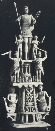 Plate IX.—Emblematic Group of Seven Figures arranged in Three Tiers carved in Bone (Peterborough Museum)