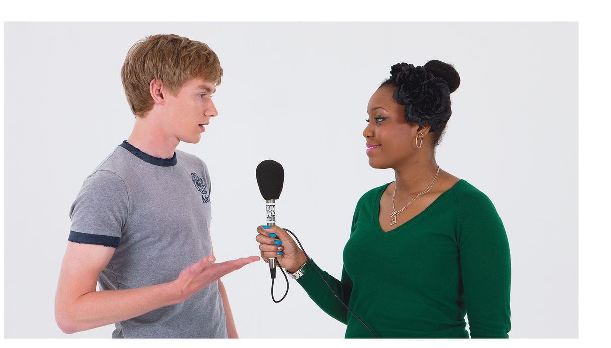 Figure 13.7 An example of the correct way to hold a microphone