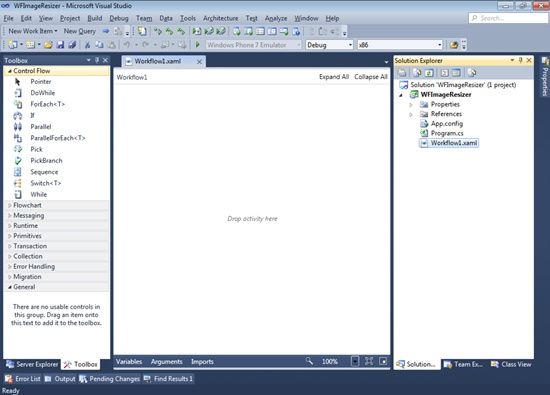 The Visual Studio IDE showing an empty Workflow Designer window