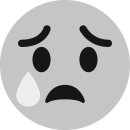 An emoji of a crying face.