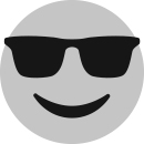 An emoji of a face with sunglasses.