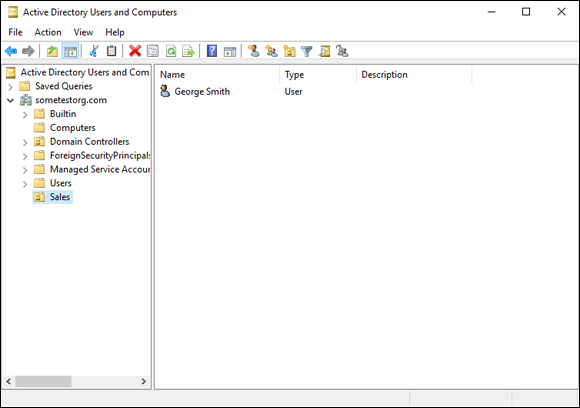 Screen capture depicting Active Directory Users and Computers screen with George Smith file in Sales folder.