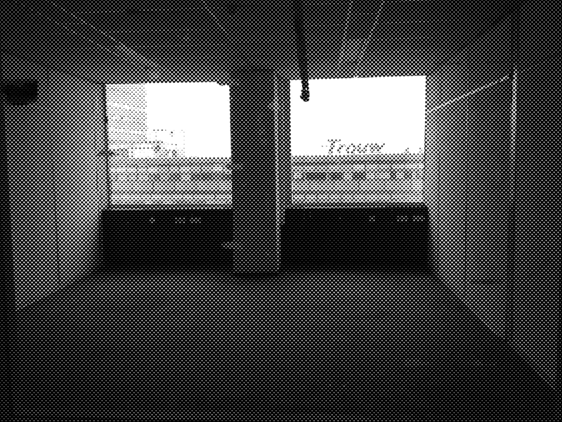 The sign of night club Trouw through the window of an empty studio as tenants were moving out. Photographer: Tanja Sihvonen.