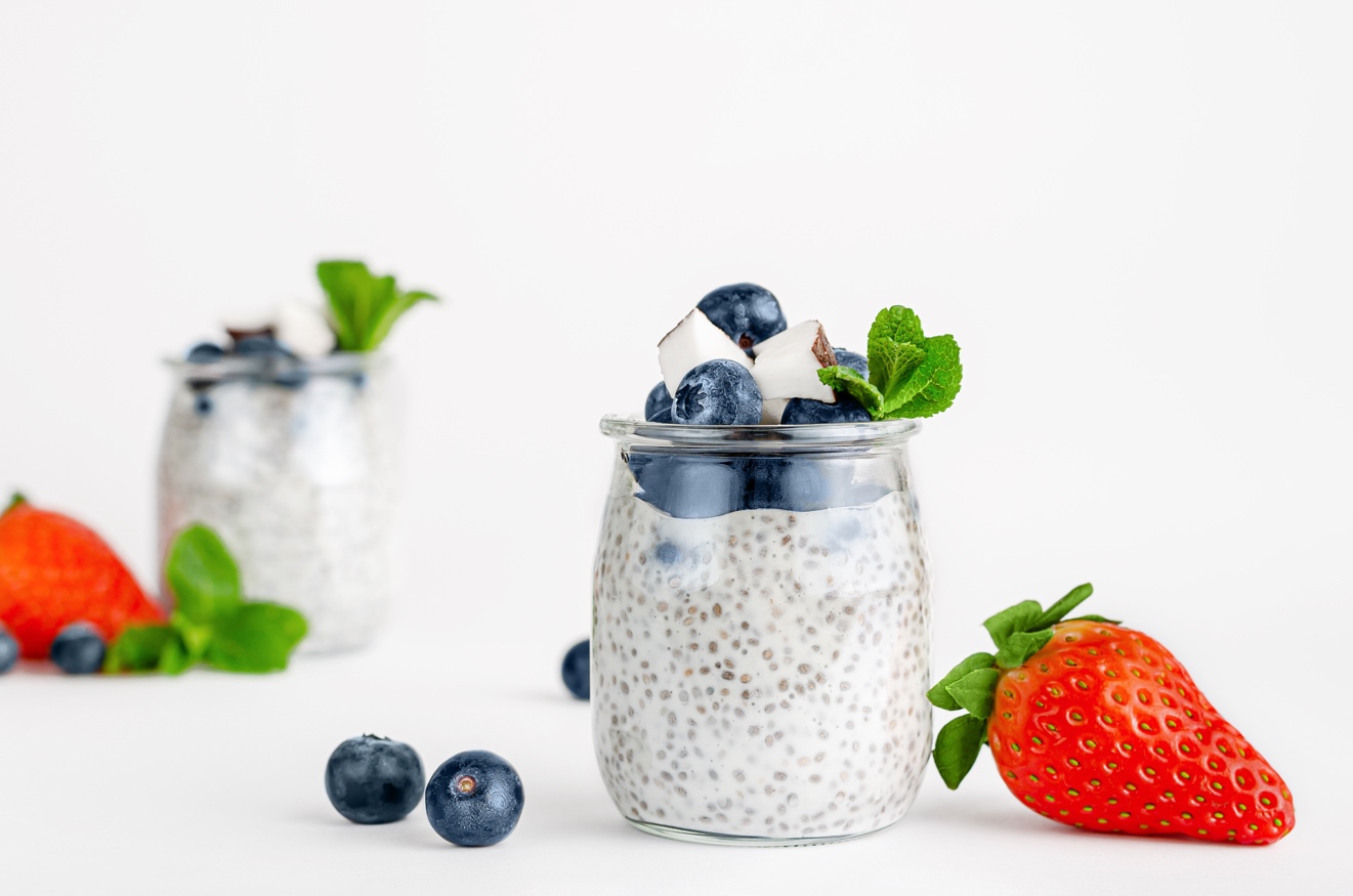 A bowl of fruit on a table Description automatically generated