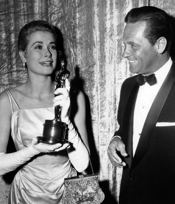 An emotional Grace, holding her Oscar, presented to her...