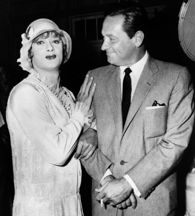 A bemused Bill poses with Tony Curtis, in full costume and makeup...