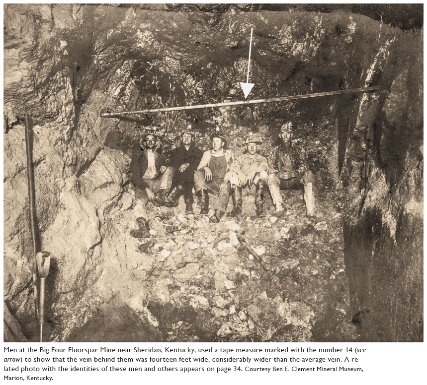 Image: Men at the Big Four Fluorspar Mine near Sheridan, Kentucky, used a tape measure marked with the number 14 (see arrow) to show that the vein behind them was fourteen feet wide, considerably wider than the average vein. A related photo with the identities of these men and others appears on page 34. Courtesy Ben E. Clement Mineral Museum, Marion, Kentucky.