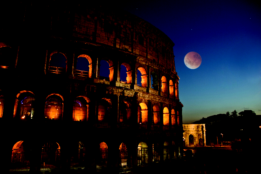 Full moon rising over the Roman Coliseum