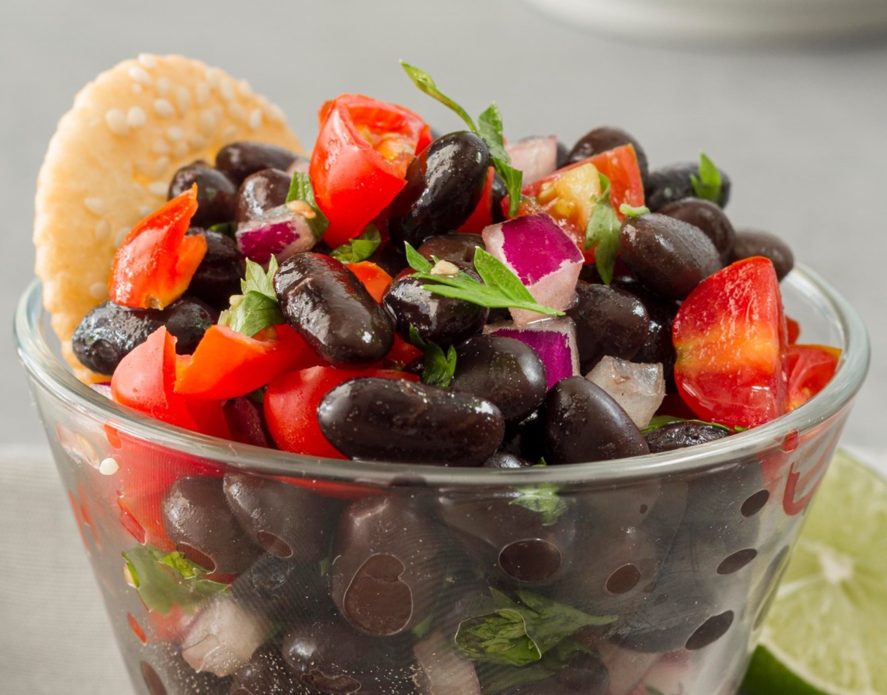 A bowl of fruit and vegetables in a cup Description automatically generated