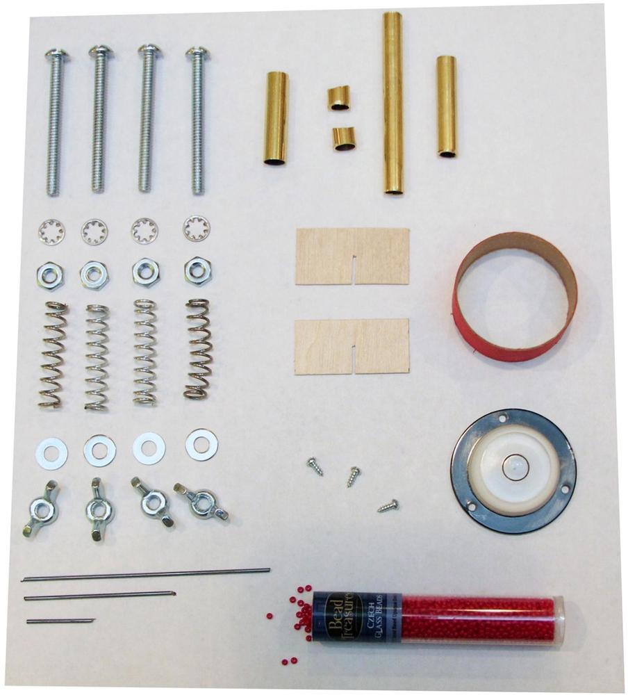 Various additional hardware is used. The two small wooden parts are cut from 1/32” plywood, but they can be cut from other thin, strong materials.