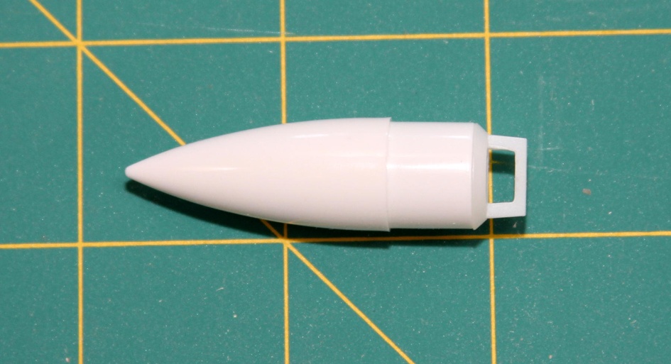 Glue the two halves of the nose cone together.