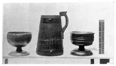 FIG. 21.—TWO WOODEN CUPS. FIG. 22.—WOODEN FLAGON, WITH COPPER BANDS. (In the National Museum of Wales.)