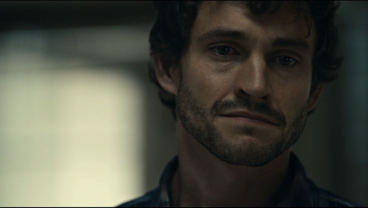 Frame from the Hannibal pilot with close up of FBI profiler Will Graham as he concludes the killer is eating body parts from his victims.