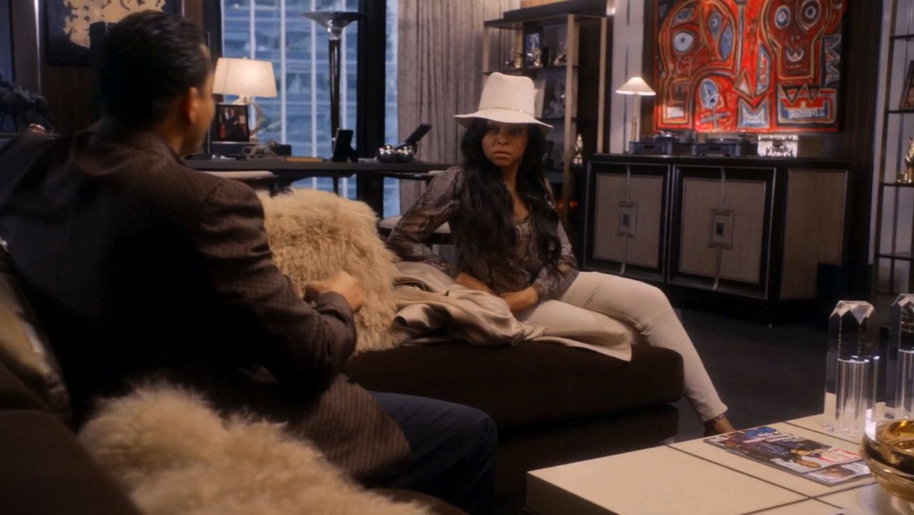 Frame from Empire pilot with Lucious Lyon and his ex-wife, Cookie Lyon, in his penthouse office.