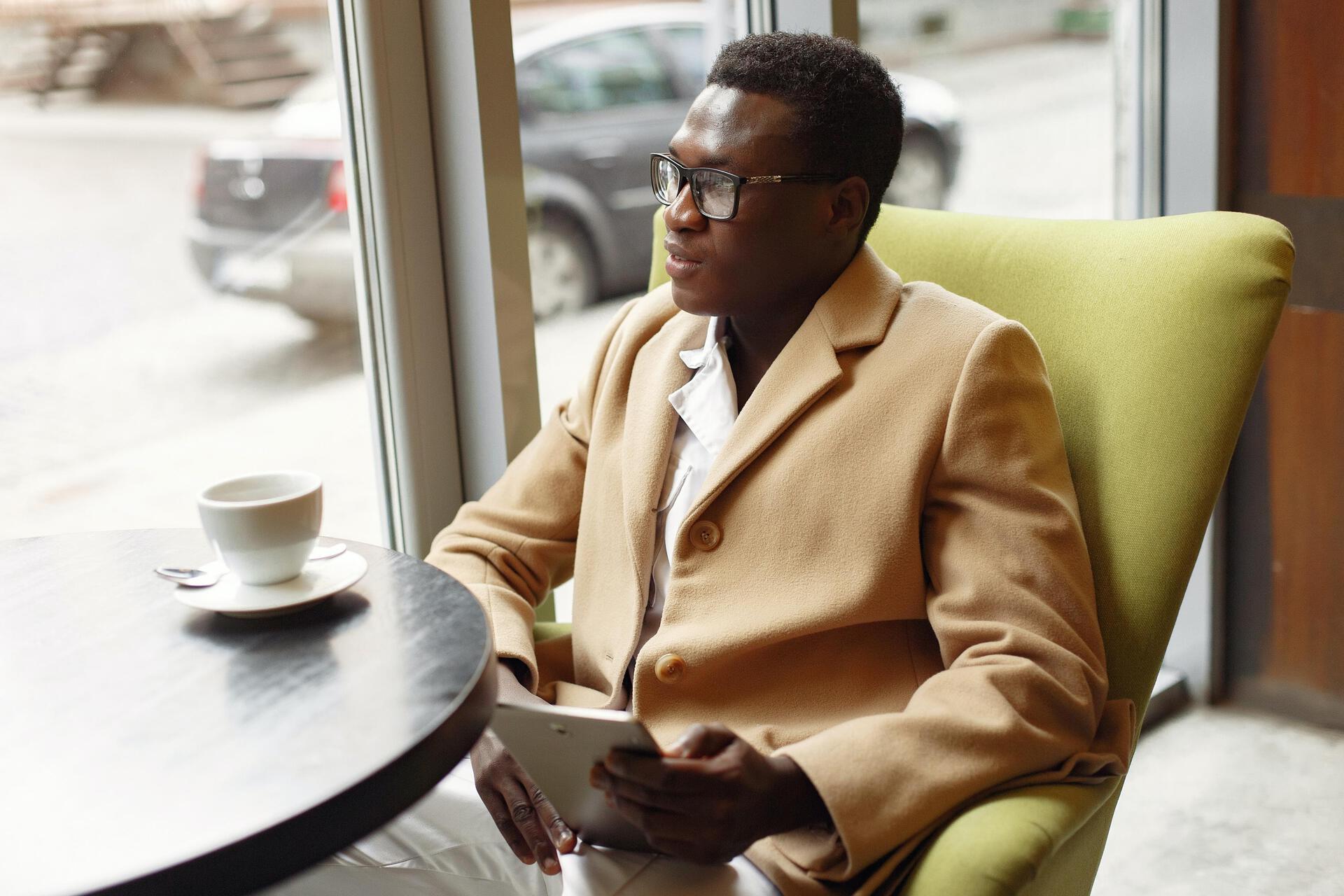 Black man in coffee shop