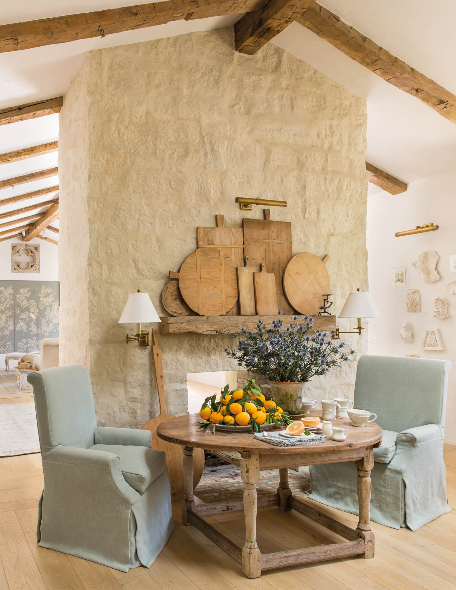 Photo of a continental-height table paired with two slipcovered Kate chairs..