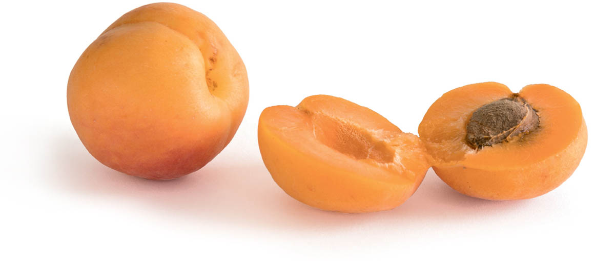 decorative photo of apricots — one whole and and one cut in half.