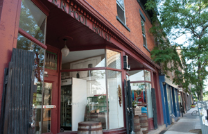 A downtown city street with boutiques and restaurants