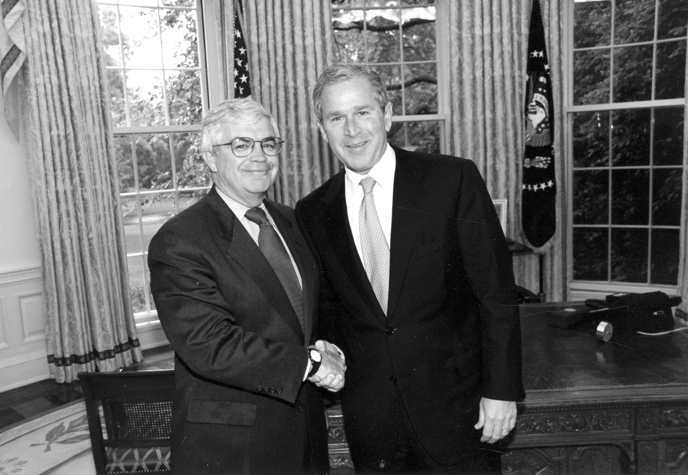 President George W. Bush with John Taylor in the White House, shortly after Taylor assumed duties as under secretary of the Treasury for international affairs, June 7, 2001. <i>The White House, courtesy John Taylor.</i>