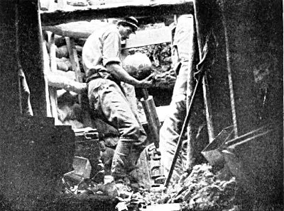 IN A TRENCH MORTAR TUNNEL, DURING THE BATTLE OF THE SOMME, AT BEAUMONT HAMEL, JULY 1ST, 1916