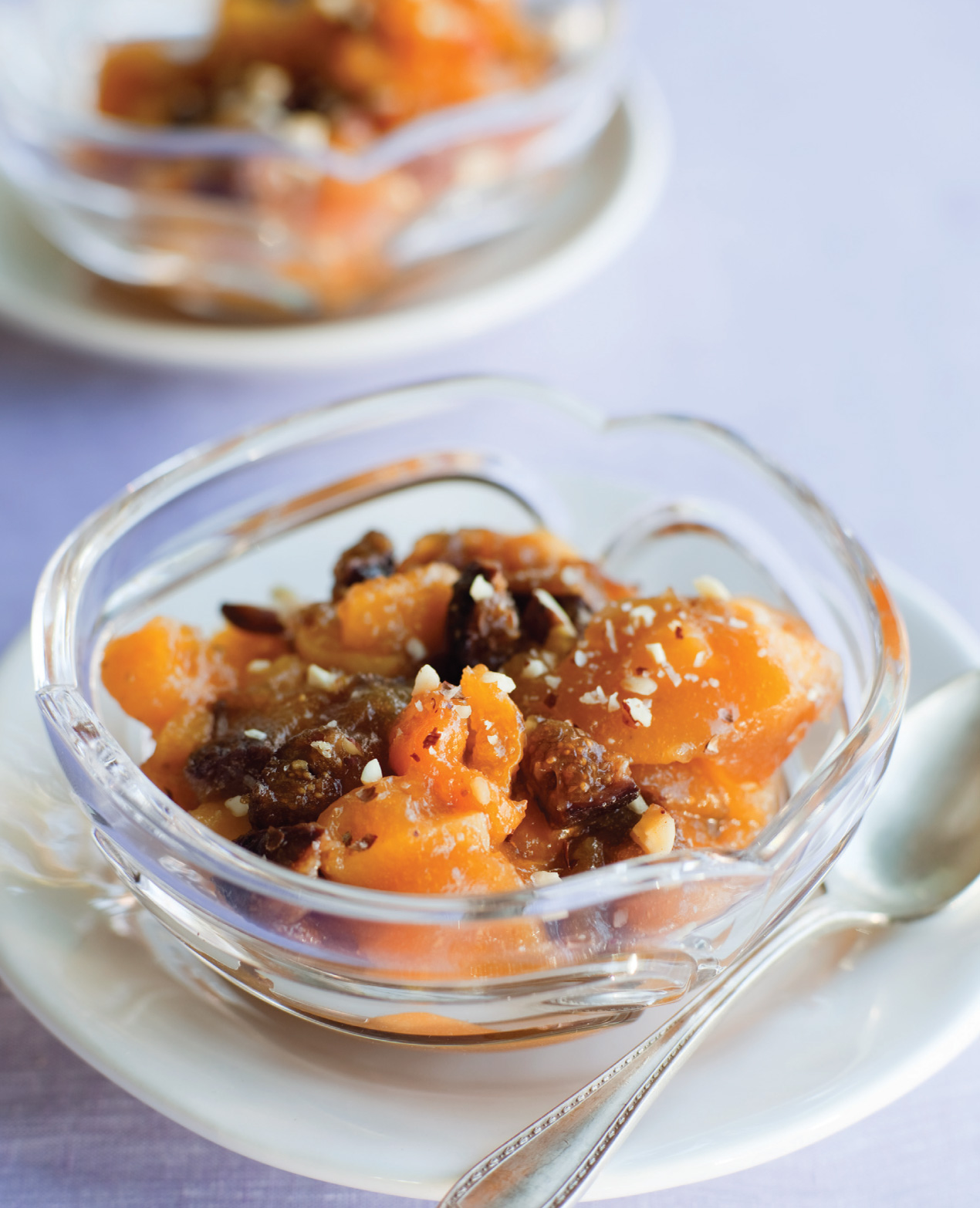 color image of Kanten with Apricots Figs and Hazelnuts in a clear glass dish.