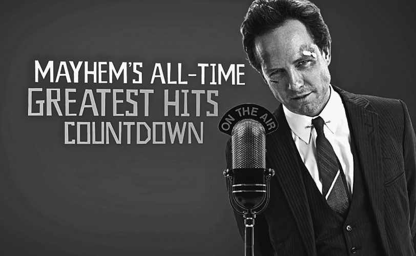 Figure representing an ad for Allstate Insurance where on the right-hand side a well-suited man, having a bruise under his right eye and another above his left eye, is standing in front of a microphone that has “On the Air” written on it. On the left-hand side is written “Mayhem's all-time greatest hits countdown.”