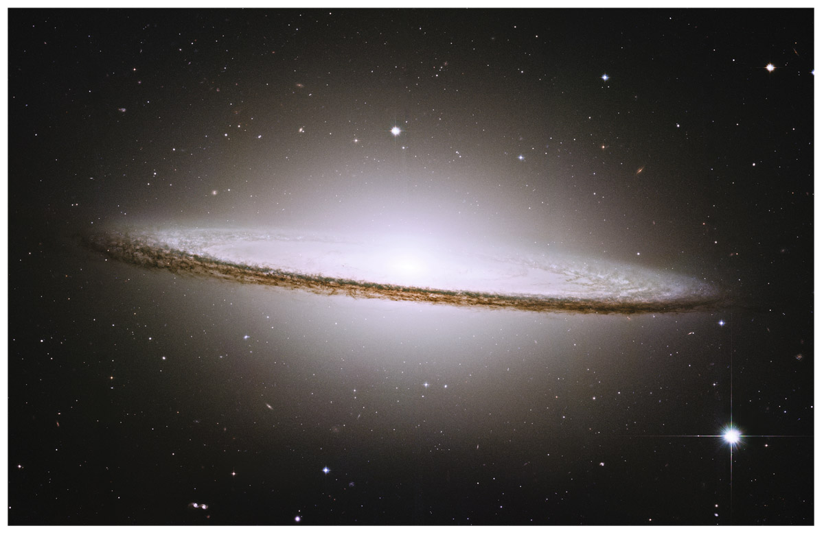  The Sombrero galaxy. The Sombrero galaxy is a spiral with a large bulge seen nearly edge-on.  NASA and the Hubble Heritage Team (AURA/STScI) Hubble Space Telescope, ACS STScI-03–28