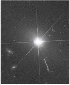  Quasar 3C 273 and its jet.  Hubble Space Telescope, NASA