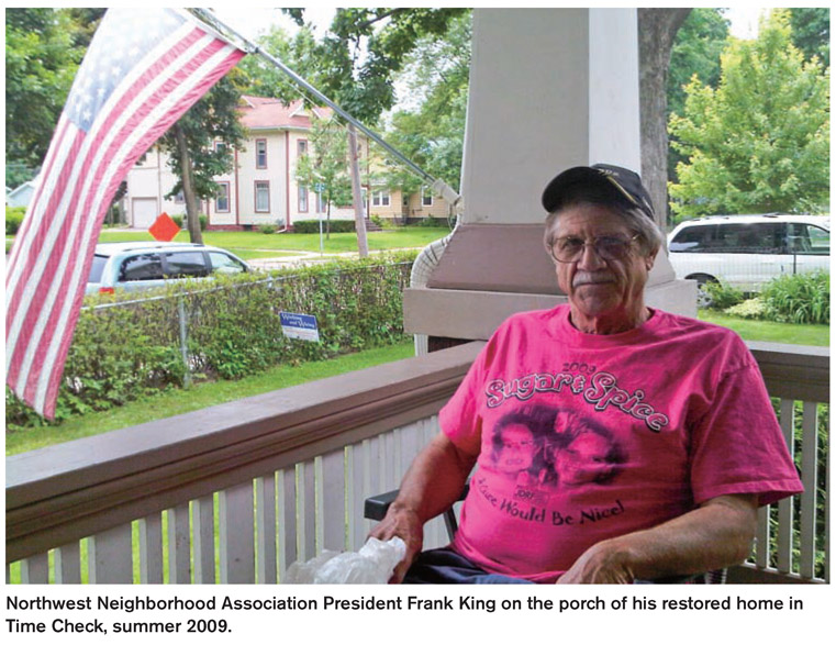 Northwest Neighborhood Association President Frank King on the porch of his restored home in Time Check, summer 2009.