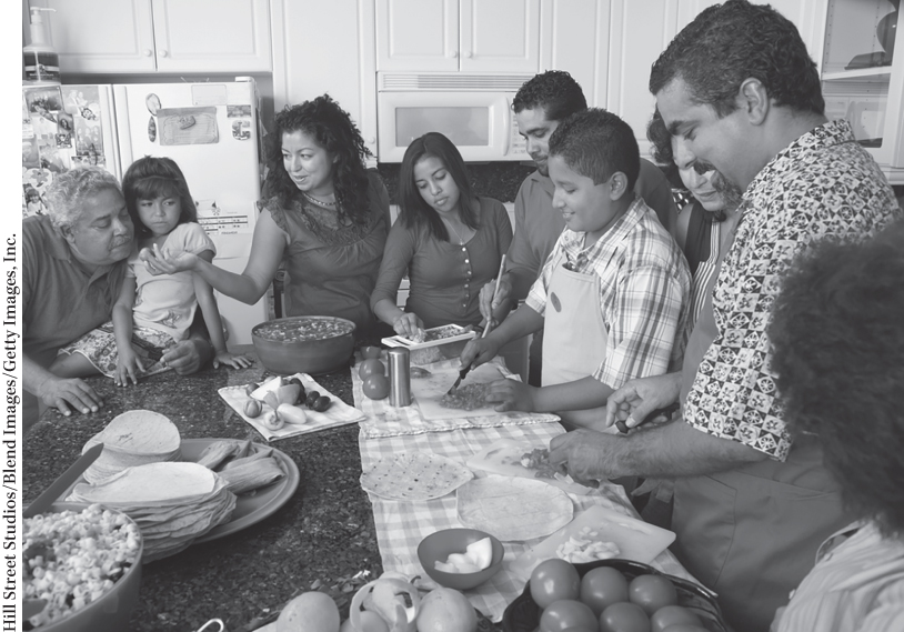 Photograph of a group of people of all ages gathered for a social cause to support each other.