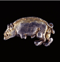 The white boar badge found at Fen Hole, the