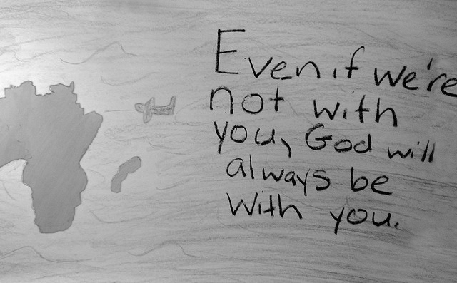 A handwritten note saying, 'Even if we're not with you, God will always be with you.