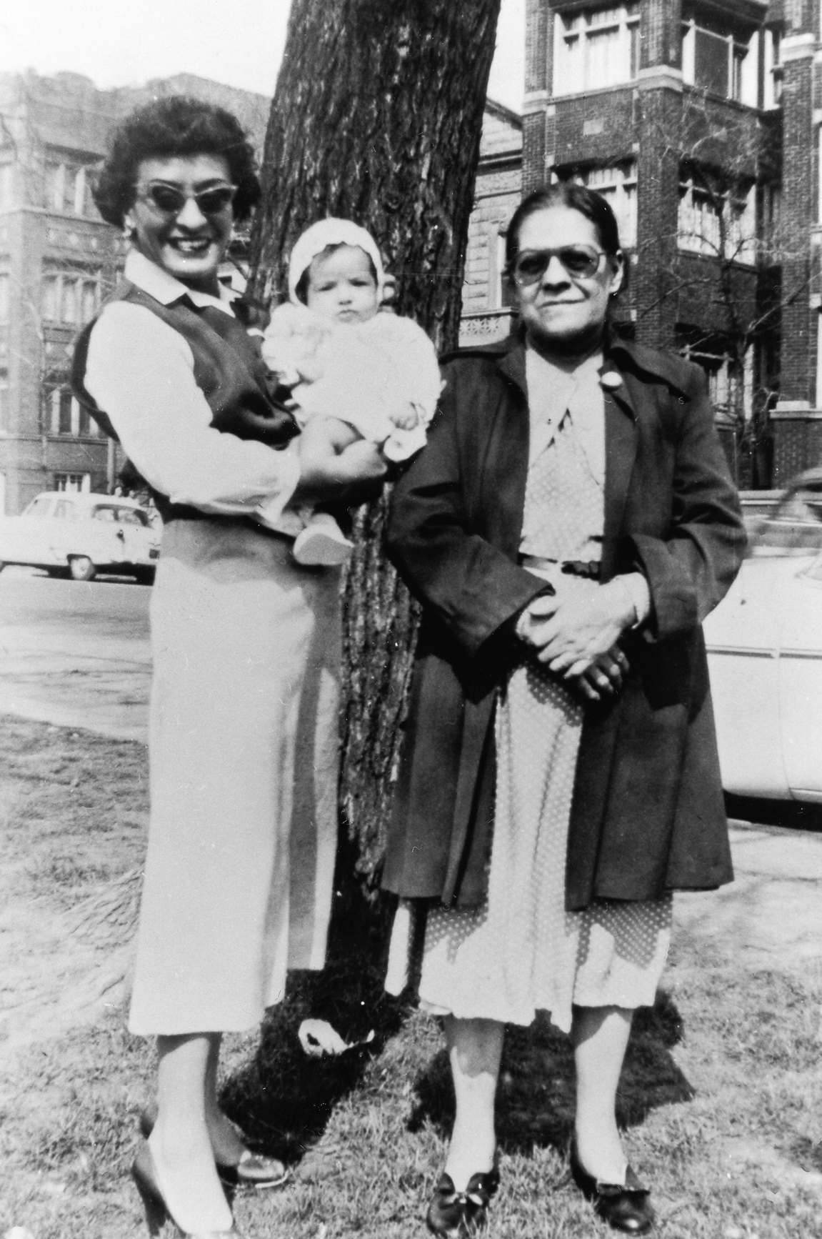 My aunt Lily (Eulalia Cordero) holding me in her arms on my baptism day, and my maternal grandmother, Felipa (María Romualda Felipa Anguiano de Cordero)