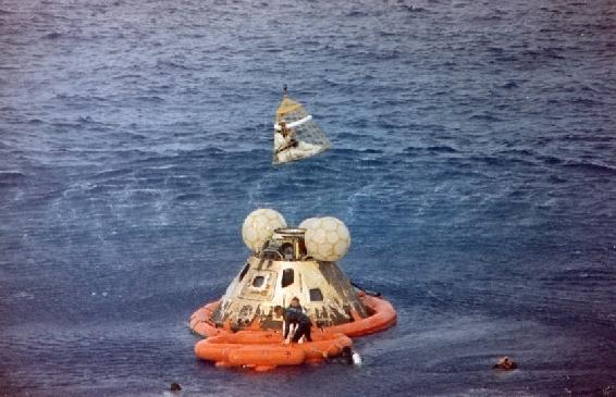 Second astronaut going up into the recovery helicopter