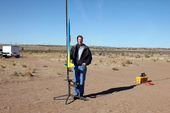 The author prepares a J rocket for flight.