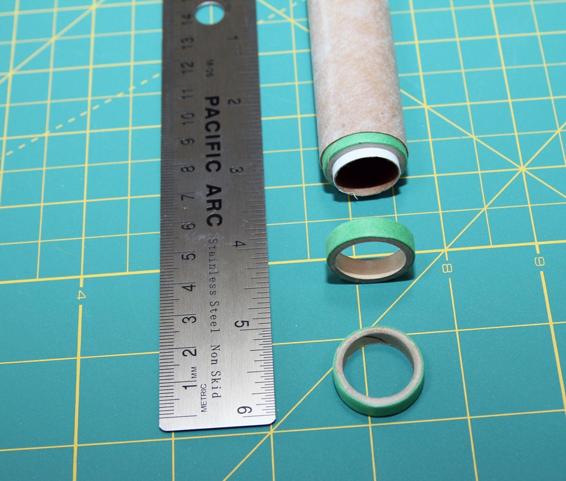 Centering rings are made from cardboard or wound paper. You can see how the centering ring holds the BT-20 perfectly in the middle of the BT-50.