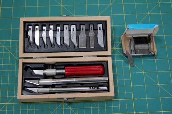 A hobby knife is essential. A nice set is very handy.